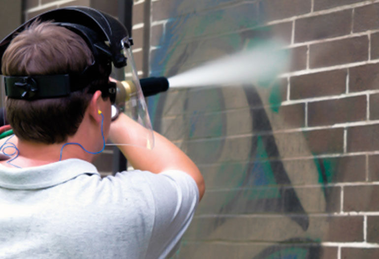 Anti-graffiti treatment for walls